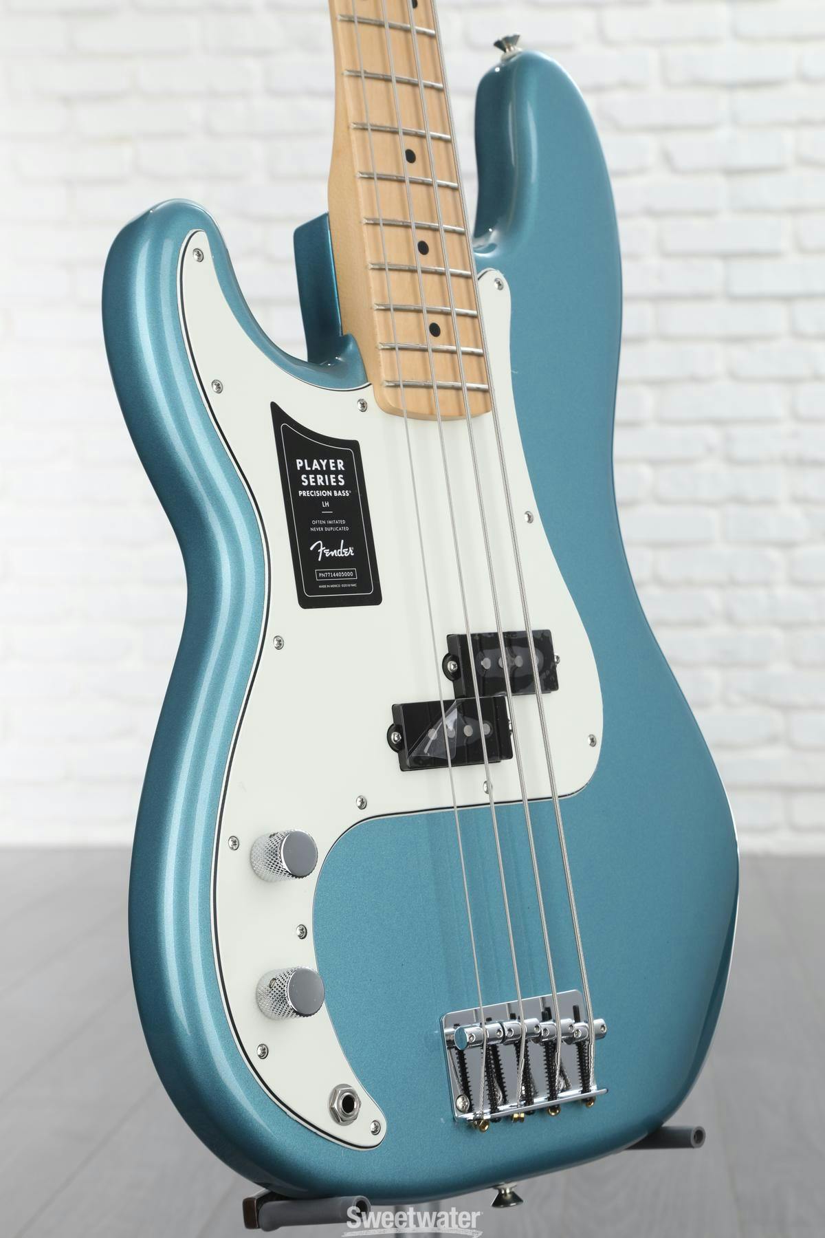 A close-up photo of Nico's left-handed Fender Precision Bass.